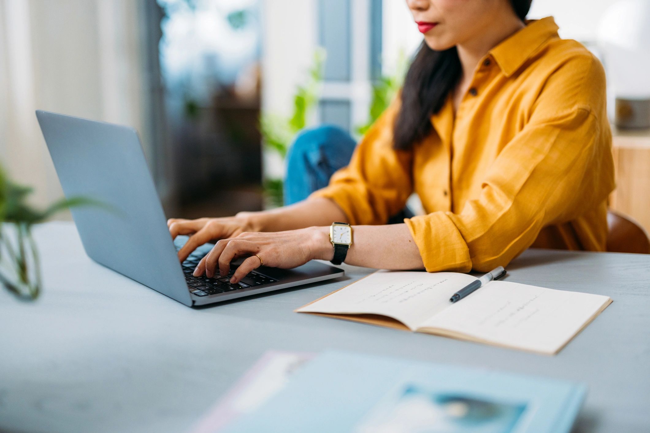 Person reviewing loan details on a laptop